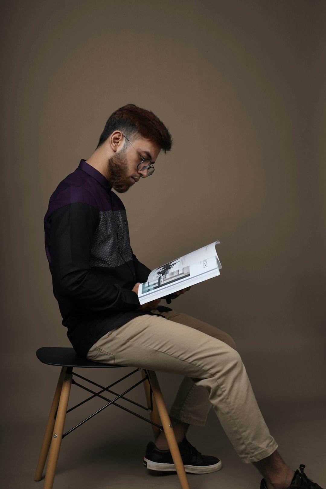 Studio portrait of a Belgian man news editing instructor